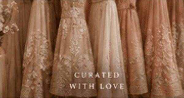 Handcrafted luxury bridal lehengas and reception gowns on boutique racks